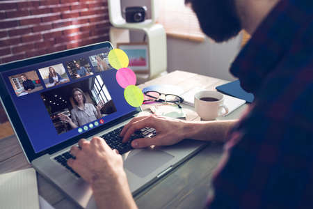 Photography apps against midsection of creative editor typing on laptopの写真素材