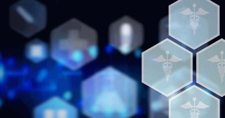 Composition of network of medical icons on hexagons over glowing blue background. global science, medicine and research concept digitally generated image.の写真素材