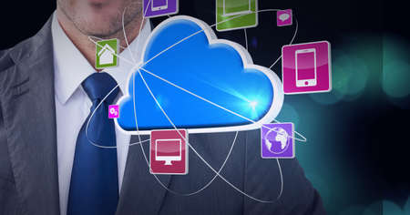 Smart devices and internet icons over a businessman, technology and corporate concepts. digitally...