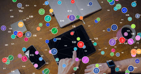 Composition of network of digital icons and numbers over man using tablet in background. global...