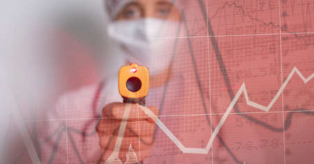 Composition of medical data processing over doctor with digital thermometer in face mask. global covid 19 pandemic, medicine, digital interface and data processing concept digitally generated image.の写真素材