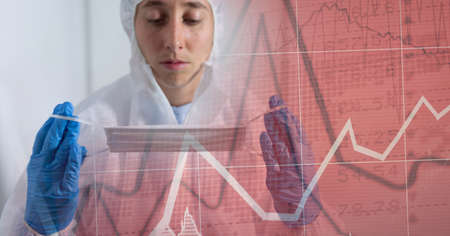 Composition of medical data processing over doctor in ppe suit with face mask. global covid 19...