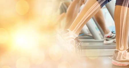 Composition of spots of light over woman running on treadmill with bones showing. exercise, active...