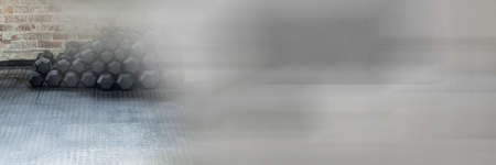 Composition of stack of dumbbells on gym floor with blurred grey light. exercise, gym equipment and...