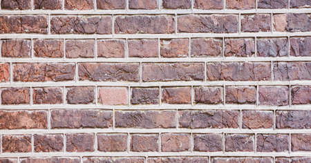 Close-up view of a mix color brick wall, backgrounds and urban concepts. digitally generated image