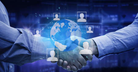 Network of profile icons over globe against mid section of two businessmen shaking hands. global...