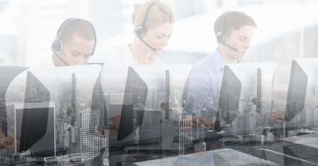 Composition of men and woman wearing phone headsets working using computers over cityscape. business...
