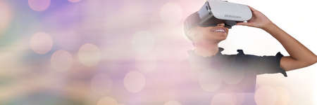 Purple sparkling transition over a woman using vr headset, virtual reality concept. digitally...