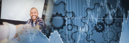 Composition of cogs and data processing over smiling man shaking hands. digital interface, business and success concept digitally generated image.の写真素材