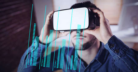 Composition of businessman wearing vr headset and data processing on digital screen. global...