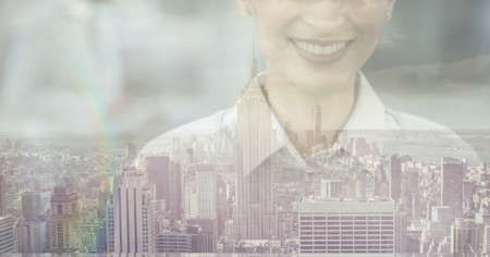 Composition of midsection of smiling female business creative over cityscape. global business and...