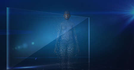 Composition of exploding human body formed with grey particles and screen on blue background. global...