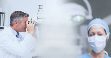 Composition of two diverse doctors with motion blur. medical science and technology concept digitally generated image.の写真素材