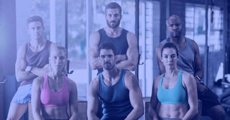 Composition of group of fit people at gym over light blur. sport, fitness and active lifestyle...
