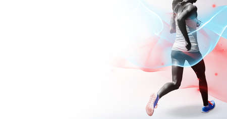 Composition of athletic woman running on white background. sport, fitness and active lifestyle concept digitally generated image.の写真素材