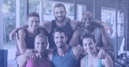 Composition of smiling men and women embracing in fitness class. sport, fitness and active lifestyle...