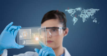 Composition of female doctor holding interactive screen with medical data processing. global online medicine and technology concept digitally generated image.の写真素材