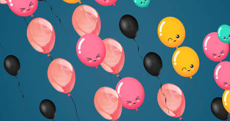 Composition of multiple black, pink and yellow balloons with faces on blue background. party and celebration concept digitally generated image.の写真素材