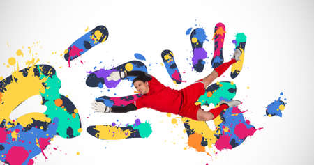 Composition of football goalkeeper over colourful handprints on white background. sports event and...