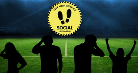 Composition of group of silhouettes raising hands on stadium over dark blur. sport during...