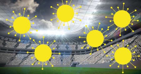Composition of yellow multiple coronavirus cells over stadium. sport during coronavirus covid 19...