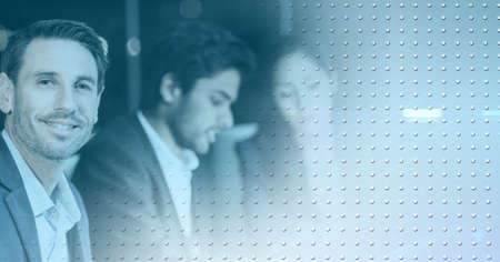 Composition of white dots over diverse group of businesspeople in modern office. global business,...