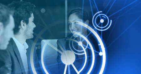 Composition of white circles over diverse group of businesspeople in modern office. global business,...