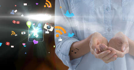 Composition of digital online icons floating with smartphone over businesswoman's hand. global...