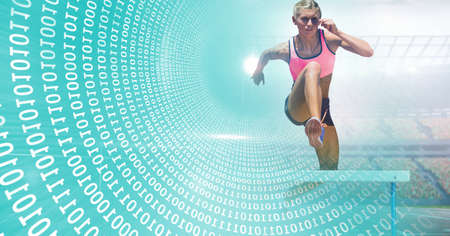 Composition of female athlete hurdle jumping with binary coding data processing. sports and competition concept digitally generated image.の写真素材