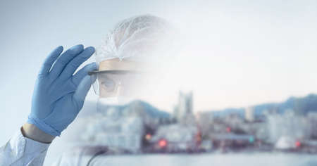 Composition of person wearing ppe suit and gloves, with blurred copy space. medical services and...