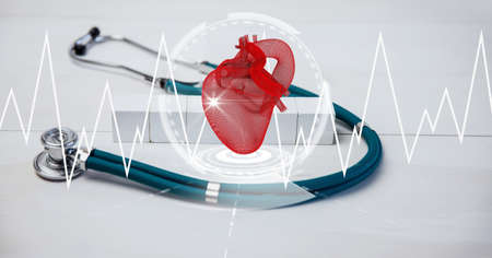 Composition of stethoscope on table, with medical heart data interface screen. global medicine, research and digital interface concept digitally generated image.の写真素材