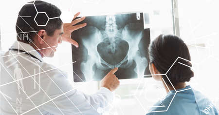 Composition of male and female doctor looking at xray with medical research data interface screen....