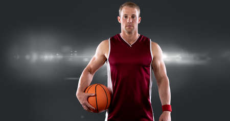 Composition of caucasian male basketball player holding ball with copy space. sport and competition concept digitally generated image.の写真素材