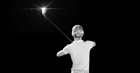 Composition of caucasian female golf player with golf club and copy space in black and white. sport...