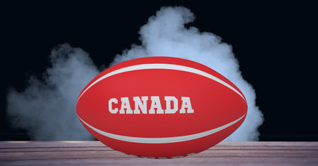 Compostion of rugby ball with text canada on black background with white smoke. championships, sports and competition concept digitally generated image.の写真素材
