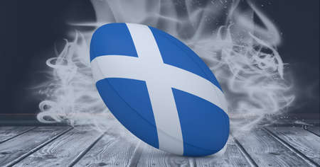 Compostion of rugby ball of scotland flag on black background with white smoke. championships, sports and competition concept digitally generated image.の写真素材