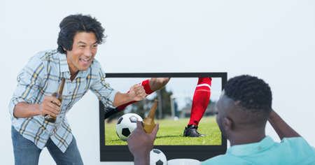 Compostion of diverse male friends watching football match on tv on white background. championships, sports and competition concept digitally generated image.の写真素材