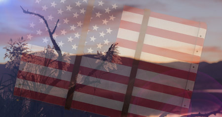 Composition of mountains and sky over american flag. patriotism and celebration concept digitally generated image.の写真素材