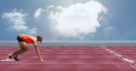 Composition of african american male runner over sports field. sport and competition concept digitally generated image.の写真素材