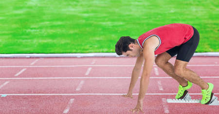 Composition of caucasian male runner over sports field. sport and competition concept digitally...