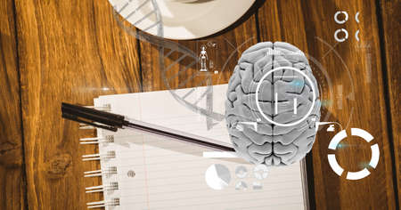 Composition of human brain and medical data processing over desk with notebook. global medicine, research, science, digital interface and technology concept digitally generated image.の写真素材