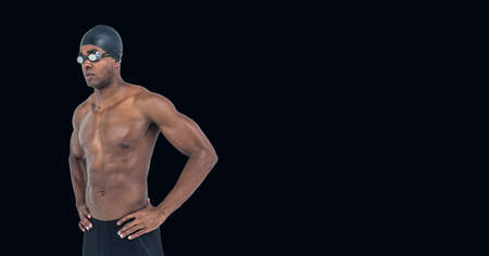 Composition of male swimmer with copy space isolated on black background. sports and competition concept digitally generated image.の写真素材