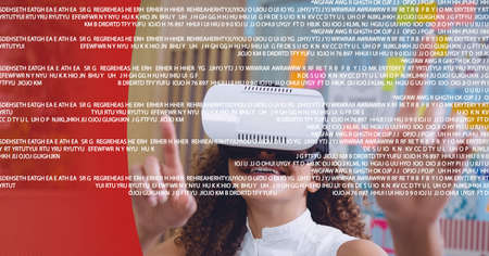 Data processing over woman wearing vr headset at office against red technology background. global...