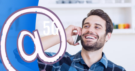 5g text over caucasian man talking on smartphone against blue technology background. global networking and technology conceptの写真素材