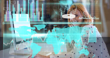 Digital interface with data processing against portrait of caucasian woman sitting at office. global...