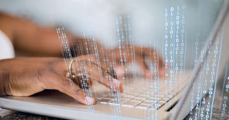 Binary coding data processing against mid section of person using laptop. global business and cyber...