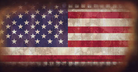 Composition of american stars and stripes flag on distressed vintage film with sprockets. patriotism, independence and celebration concept digitally generated image.の写真素材