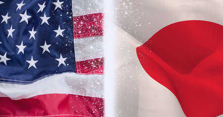Composition of waving japanese and american stars and stripes flags and central glowing white line....