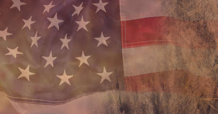 Composition of wheatfield over vintage stars and stripes american flag. patriotism, independence and celebration concept digitally generated image.の写真素材