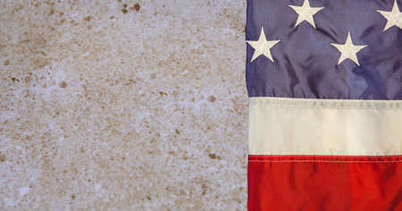 Composition of folded american flag on wood particle board. patriotism, independence and celebration concept digitally generated image.の写真素材